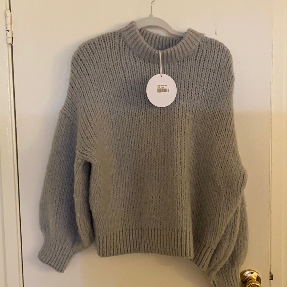 Selling a cute crew sweater from Princess Polly.